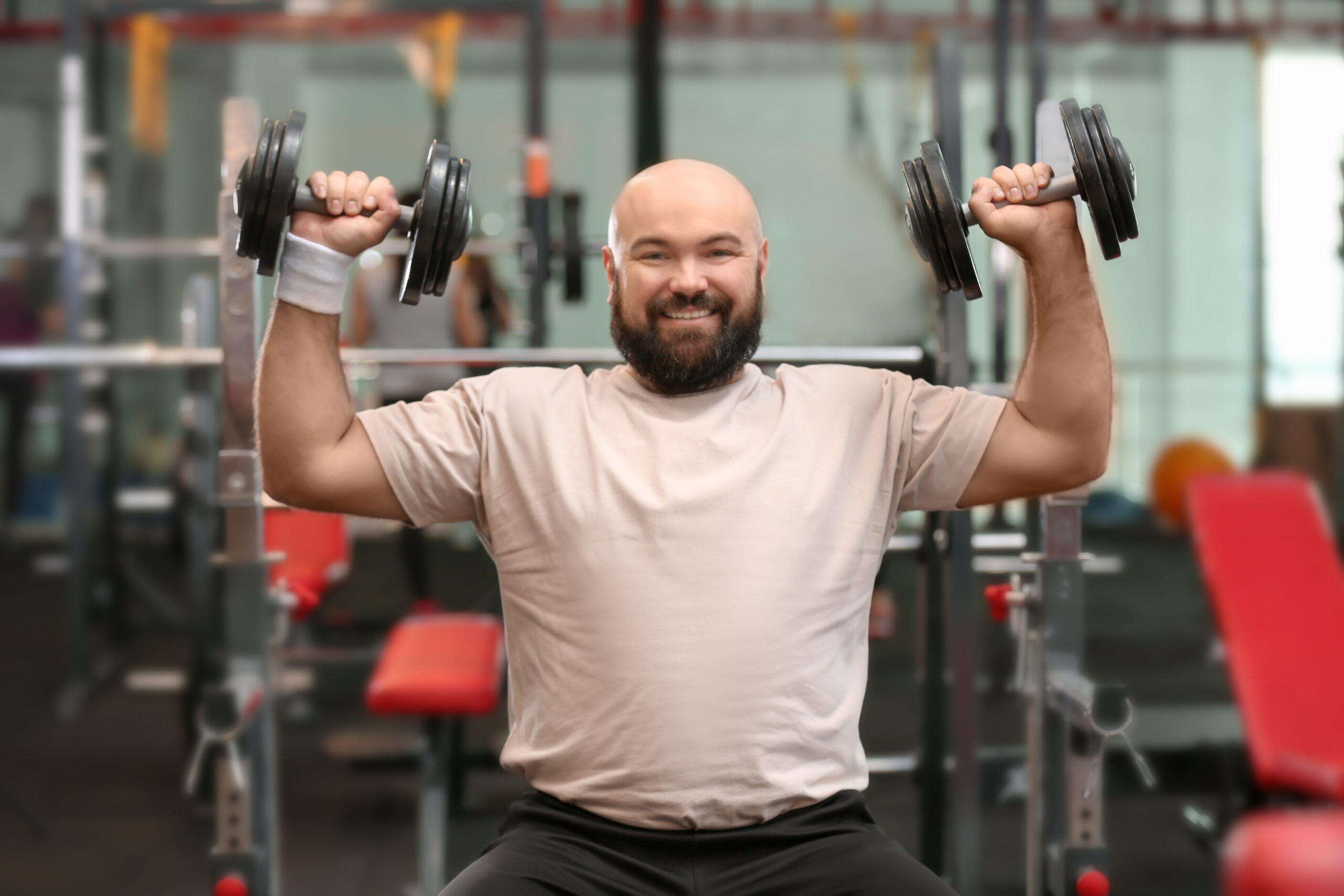 Person training with dumbbells